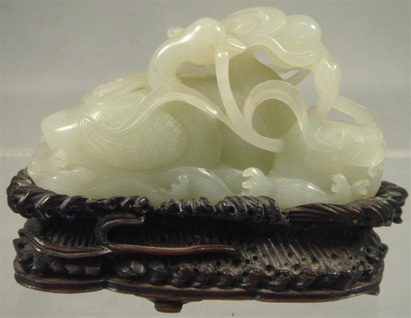 Appraisal: th th c Chinese carved jade group with ducks on