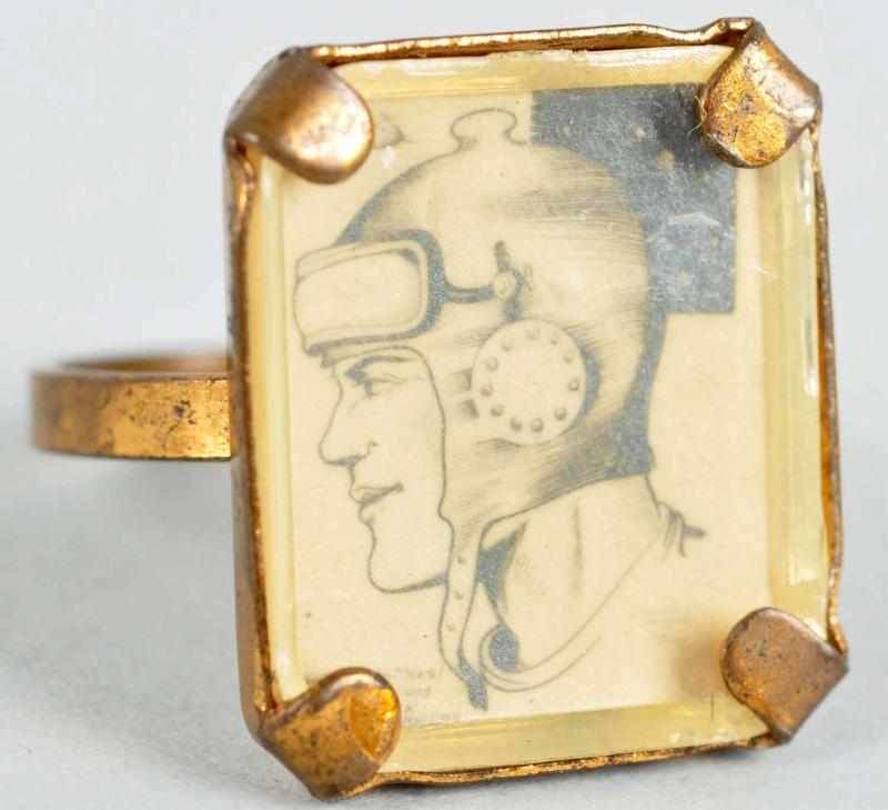 Appraisal: Buck Rogers Portrait Ring Description Has a miniature newspaper comic