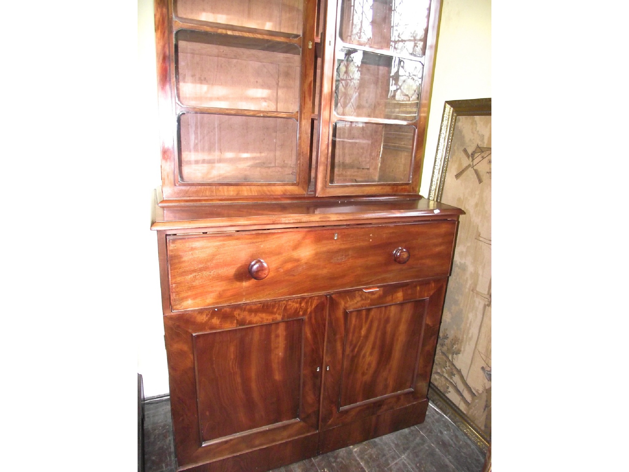 Appraisal: A mid Victorian mahogany secretaire bookcase the lower section enclosed