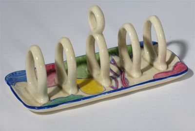 Appraisal: Pastel Autumn' a Clarice Cliff Bizarre toast rack painted in