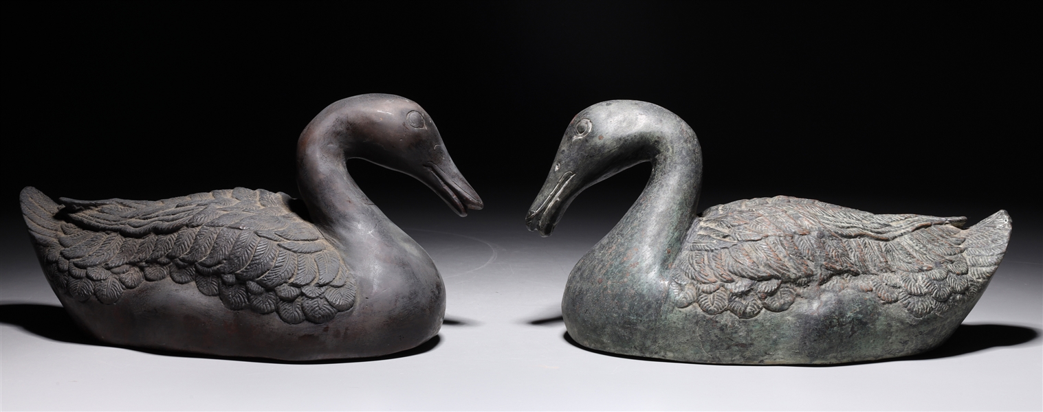 Appraisal: Pair of Chinese bronze metal ducks overall good condition each