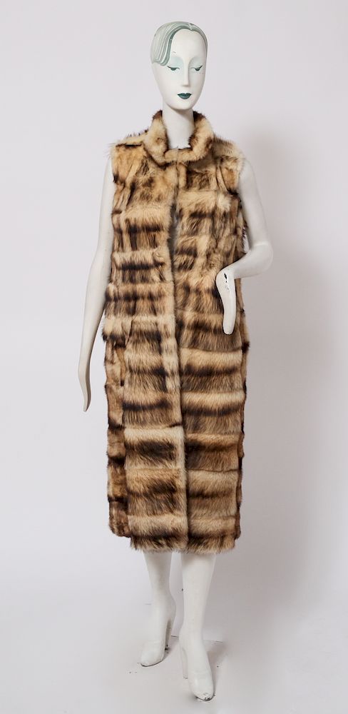 Appraisal: Ladies' Long Tan Brown Fur Vest Ladies' long tan and