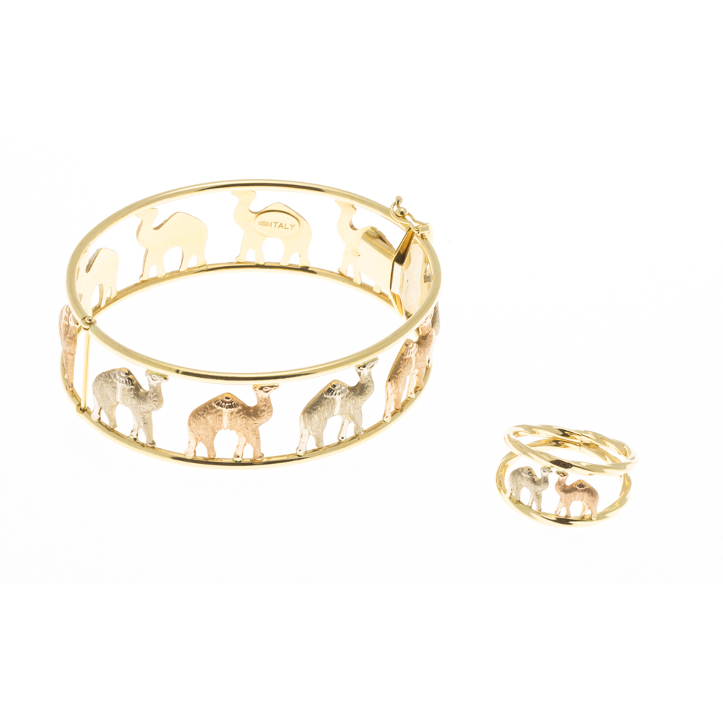 Appraisal: A modern bangle and matching ring the bangle of hinged