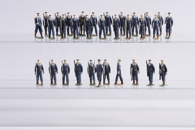 Appraisal: Lot of metal Royal Navy figures marching Mostly converted Britains