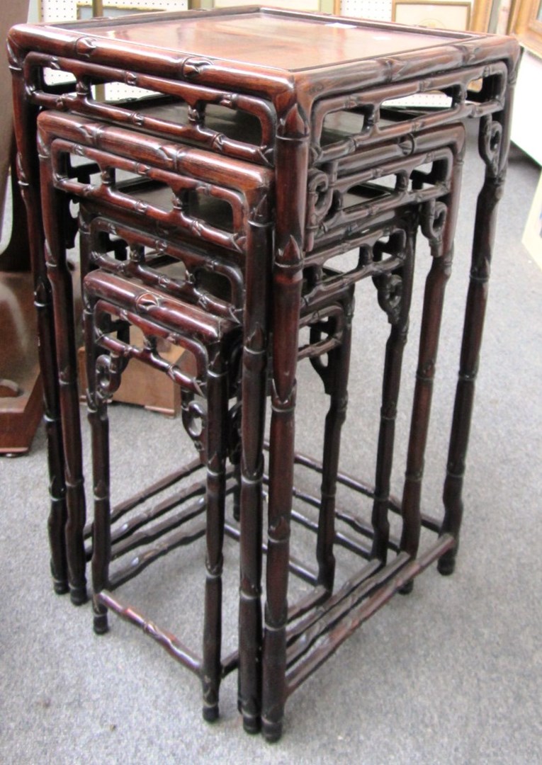 Appraisal: A set of four Chinese rosewood quartetto tables with faux