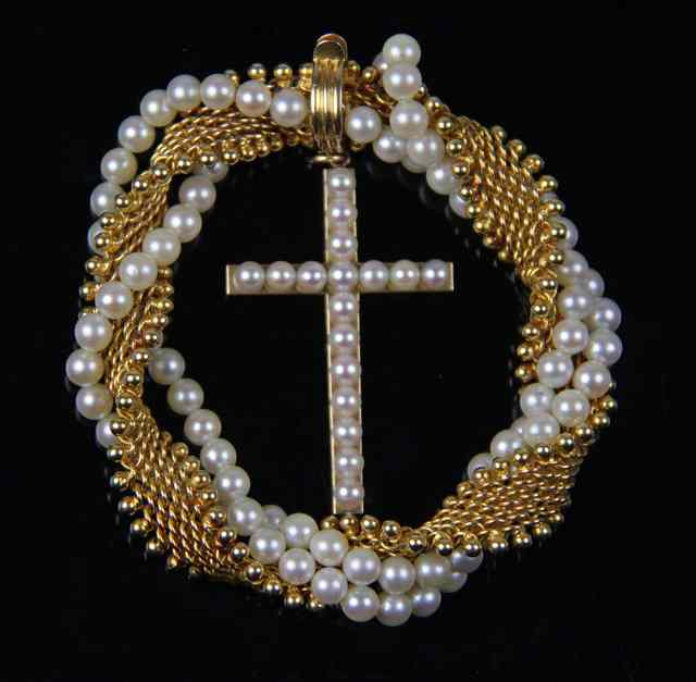 Appraisal: An ct gold and pearl bracelet of interlaced ropetwist form