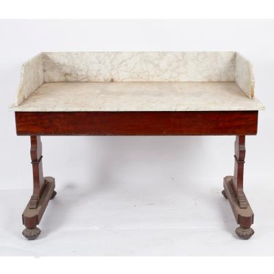 Appraisal: A Victorian marble-topped washstand with three-quarter gallery on end supports