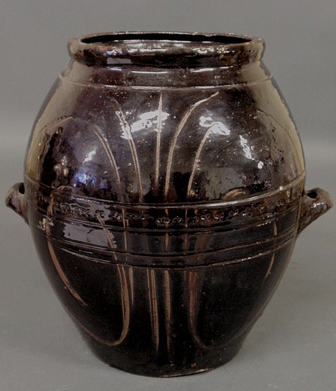 Appraisal: Large incised redware crock with applied handles and black manganese