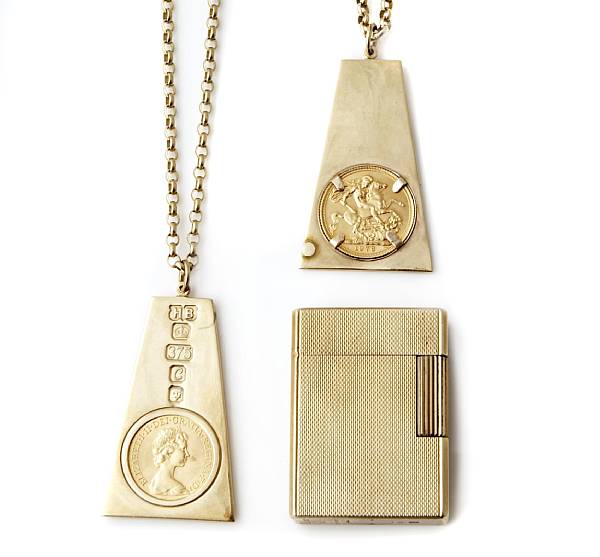 Appraisal: Two k gold pendant necklaces and a gold plated lighter