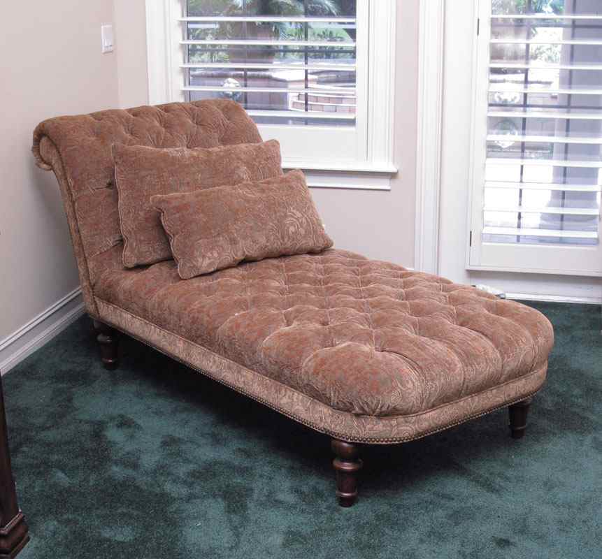 Appraisal: CONTEMPORARY UPHOLSTERED CHAISE LOUNGE Antique style tufted fabric scrolled head