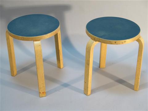 Appraisal: PAIR OF ALVAR AALTO THREE-LEG STOOLS Mid th century designed