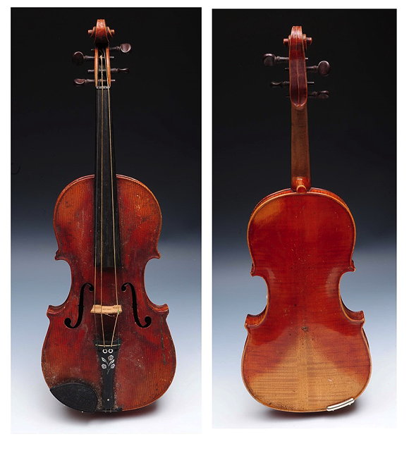 Appraisal: AN OLD VIOLIN bearing 'Joseph Guarnerius' label and also incised