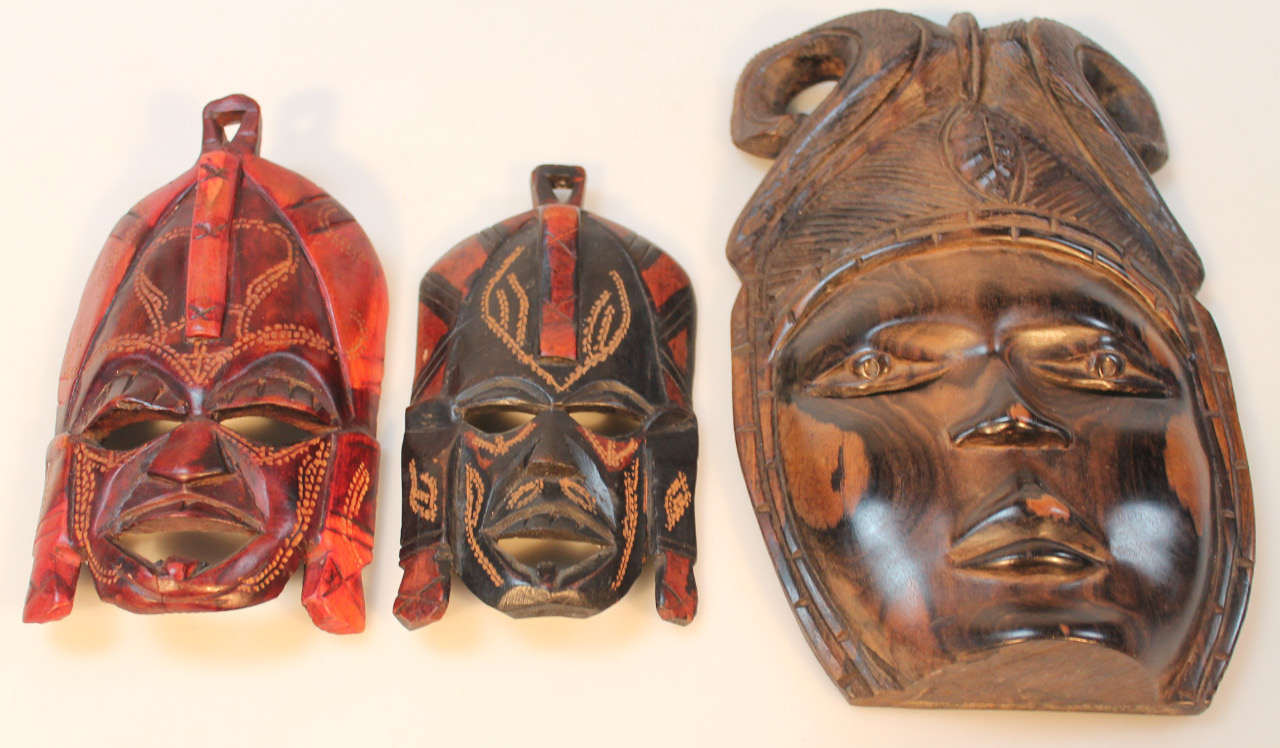 Appraisal: A thC African hardwood mask formed as a female figure