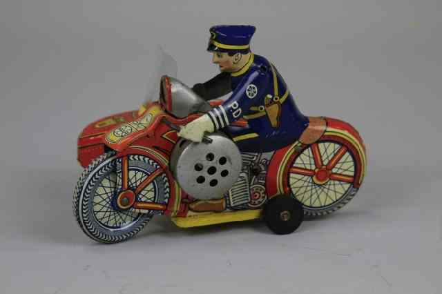 Appraisal: SPARKLING POLICE CYCLE WITH SIDECAR Marx lithographed tin red cycle