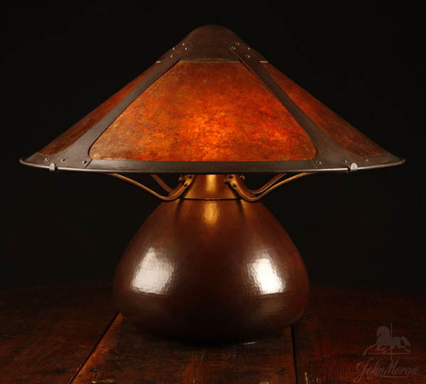 Appraisal: An Aurora Studios hammered copper mica lamp An Aurora Studios