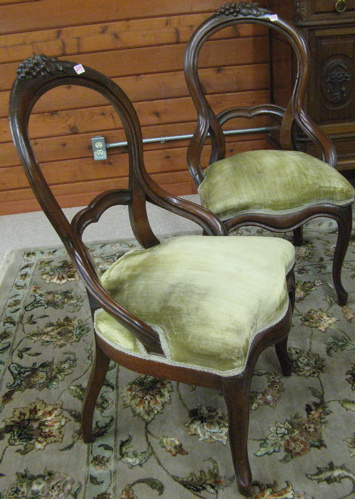 Appraisal: A SET OF FOUR VICTORIAN BALLOON-BACK CHAIRS Rococo Revival design