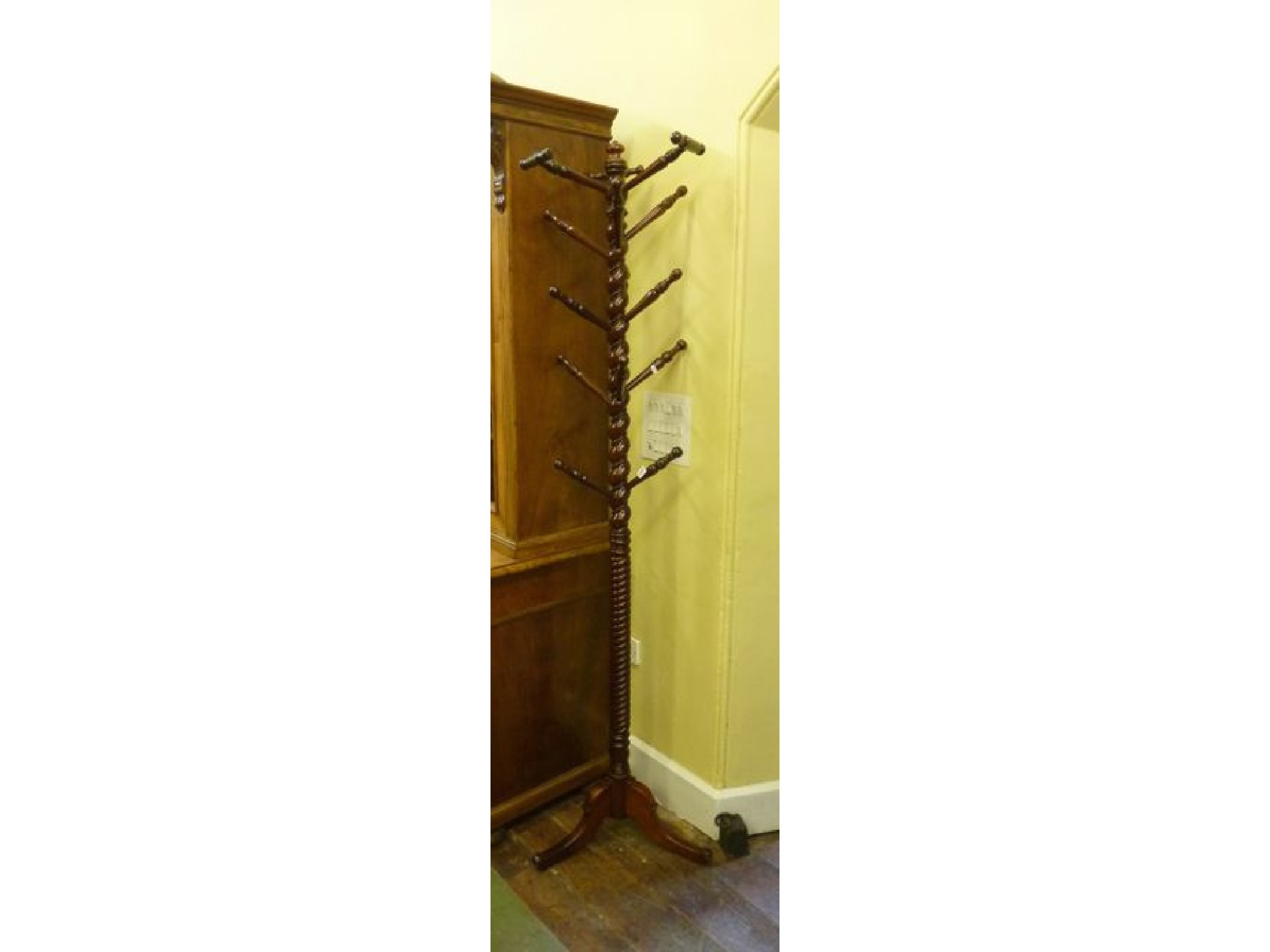 Appraisal: A th century mahogany hat stand with barley twist column