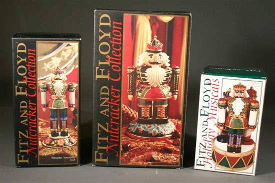 Appraisal: Three Fitz Floyd ceramic nutcracker figures Pine Cone nutcracker Poinsettia