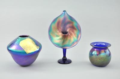 Appraisal: A Group of Three Iridescent Art Glass Vases Containing a