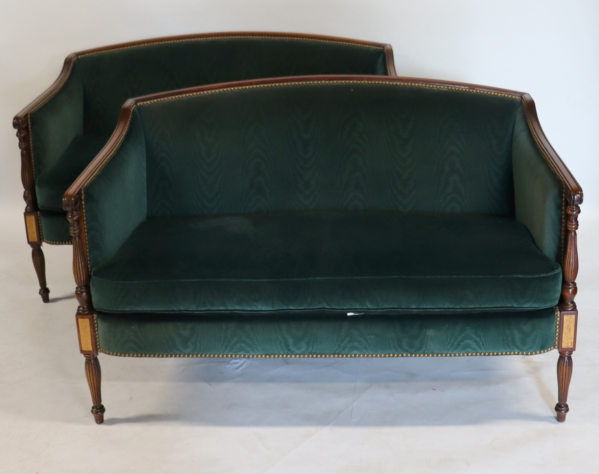 Appraisal: A VINTAGE PAIR OF FINE QUALITY UPHOLSTERED Sheraton Style Settees