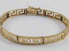 Appraisal: A yellow metal tests ct gold bracelet of Grecian key