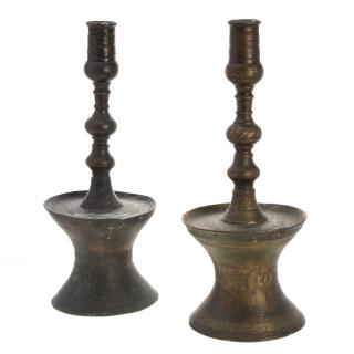 Appraisal: Near pair Islamic bronze capstan candlesticks Near pair Islamic bronze