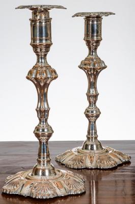 Appraisal: A pair of early George III Sheffield plate candlesticks with