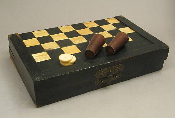 Appraisal: An Anglo Indian ivory and ebony folding games board th