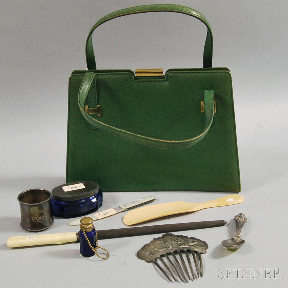 Appraisal: Eight Glass and Metal Accessories and a Green Leather Gucci