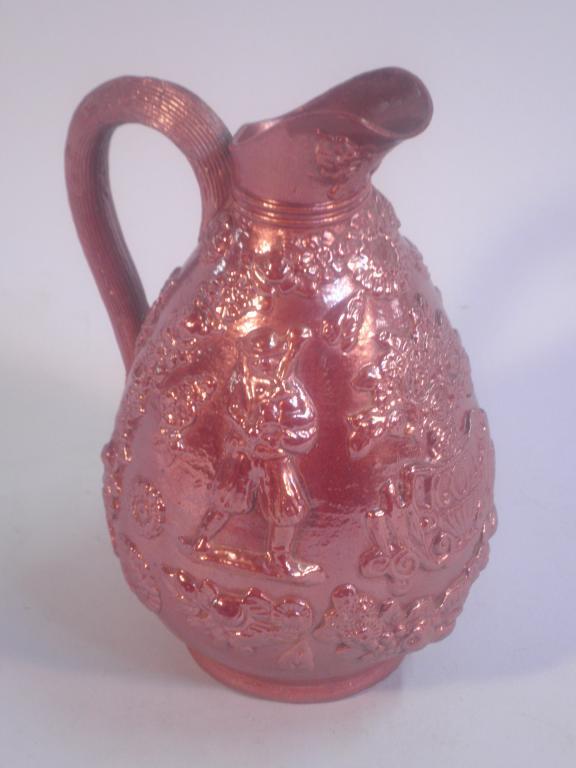 Appraisal: An early mid thC salt glazed jug with applied decoration