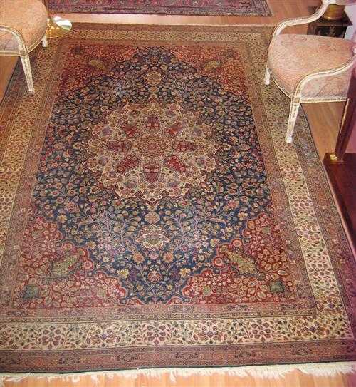 Appraisal: TABRIZ old White central medallion on a blue ground with