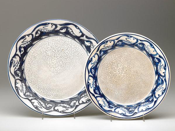 Appraisal: DEDHAM Crackleware two early Dolphin plates Staining to smaller CPUS