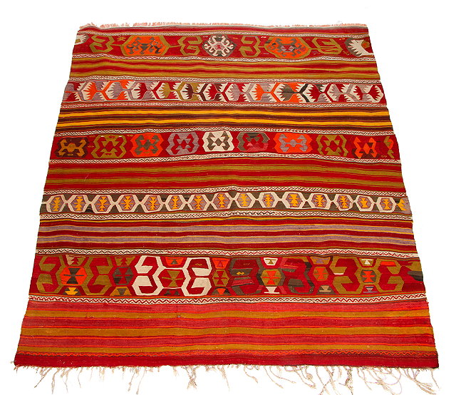 Appraisal: A TURKISH KELIM with bands of stylised flower and stripe