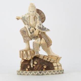 Appraisal: Japanese Carved Bone Polychrome Fisherman Figurine Japanese Carved Bone Polychrome