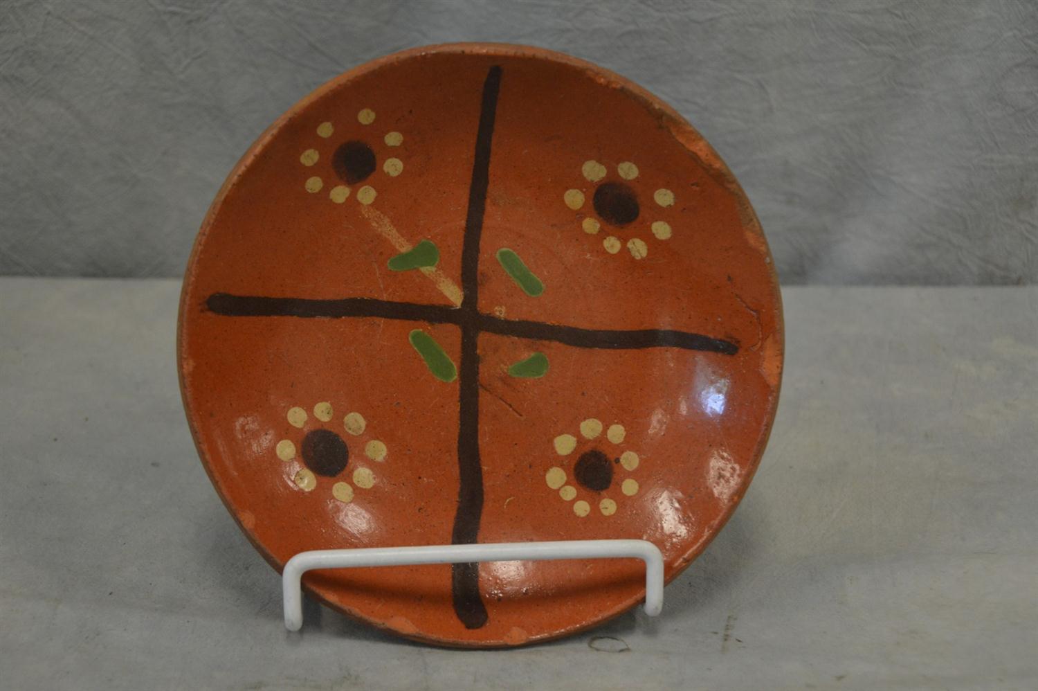 Appraisal: Redware plate -color decoration in geometric design early th C