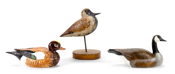 Appraisal: A group of five mixed media models of birds height