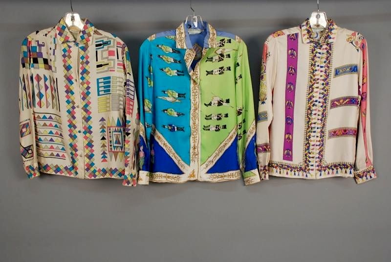 Appraisal: THREE PUCCI PRINTED SILK BLOUSES s All long sleeve One