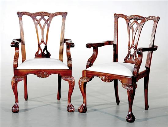 Appraisal: Pair George III style carved mahogany armchairs yoked and eared