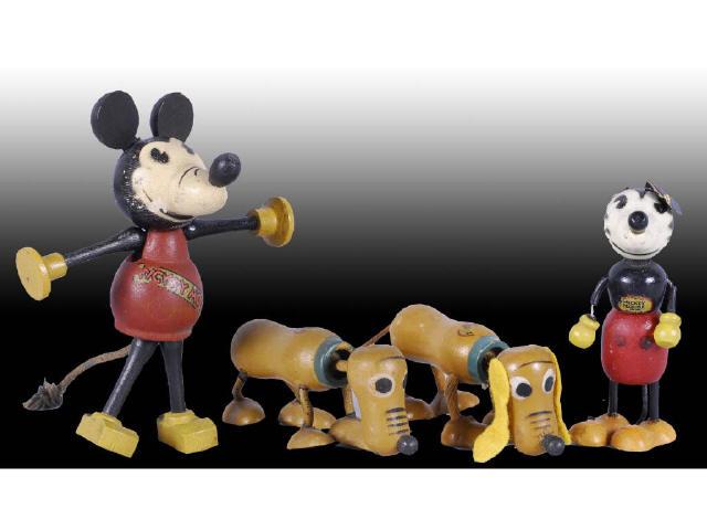 Appraisal: Lot of Walt Disney Fun-E-Flex Toys Description Rare Mickey Mouse