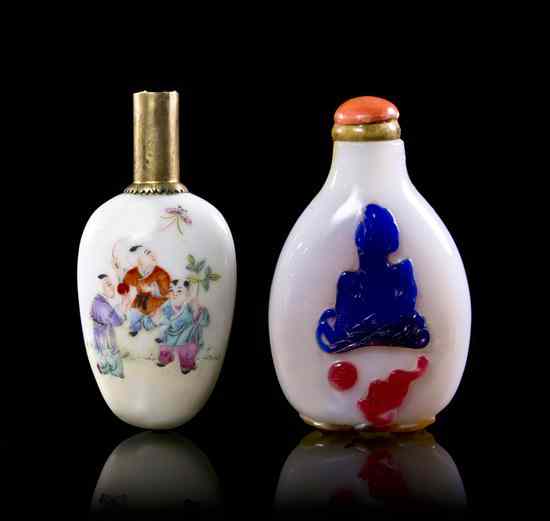 Appraisal: Two Chinese Snuff Bottles comprising a famille rose decorated pebble