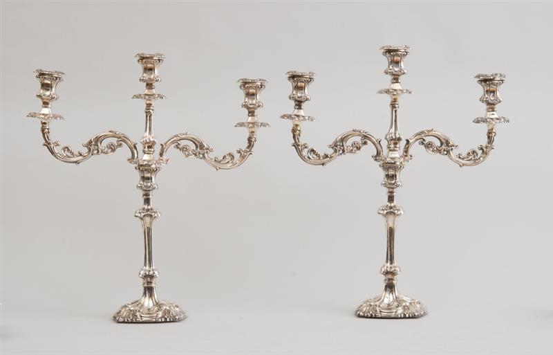 Appraisal: PAIR OF ENGLISH WEIGHTED SILVER CANDLESTICKS Marked for Walker Hall