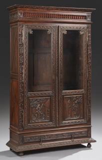 Appraisal: French Provincial Carved Oak Bookcase th c Br French Provincial