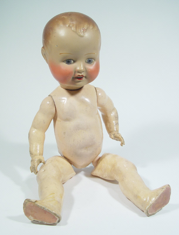 Appraisal: B J china headed doll with painted decoration and jointed