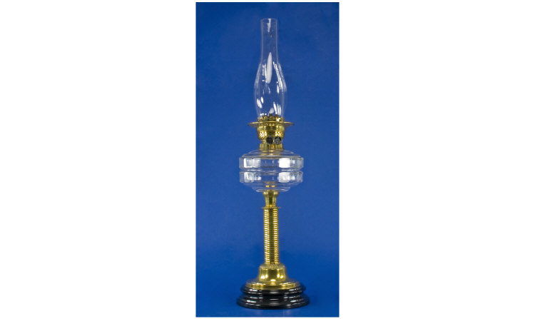 Appraisal: th Century Brass and Glass Oil Lamp on black turned