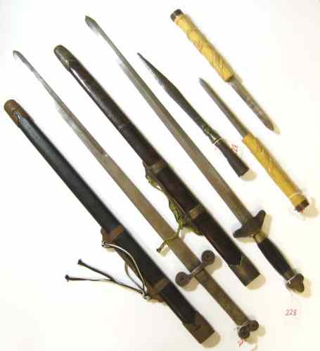 Appraisal: THREE CHINESE SWORD PLUS A SPEAR POINT carved bamboo staff