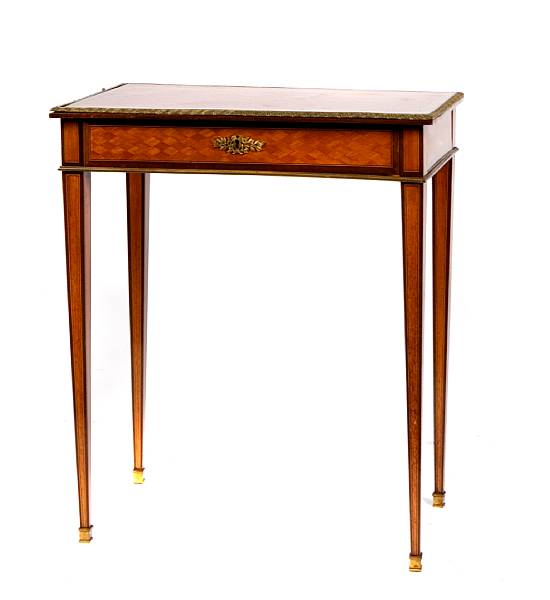 Appraisal: A Louis XVI style gilt bronze mounted parquetry side table