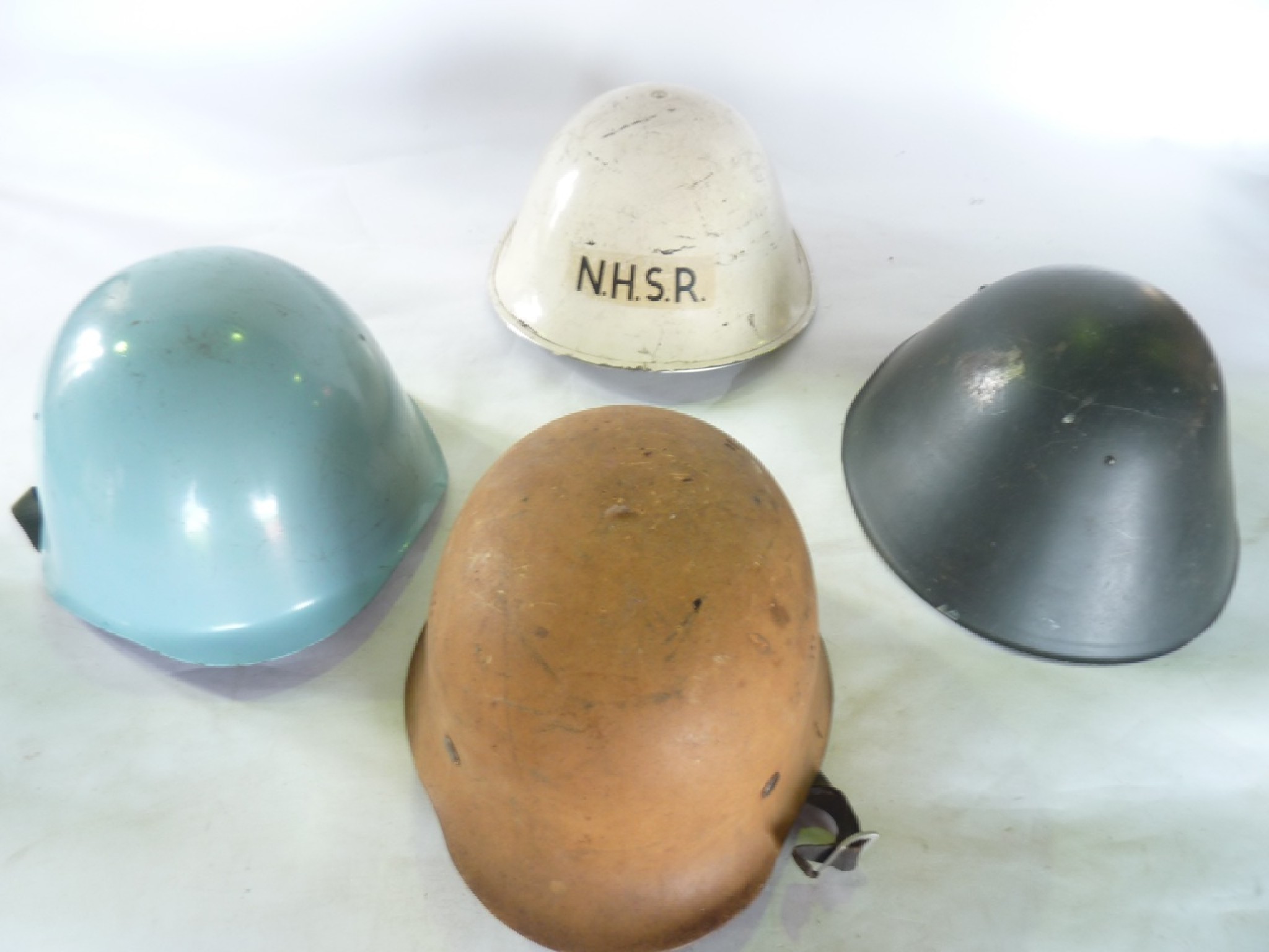 Appraisal: Four th century military helmets to include a German example