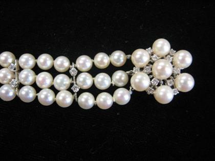 Appraisal: karat white gold pearl and diamond triple strand bracelet loose