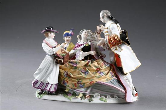 Appraisal: PORCELAIN FIGURAL GROUP WITH PEDDLARS Continental th century porcelain Couple