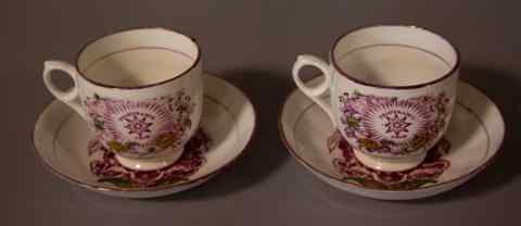 Appraisal: TWO STAFFORDSHIRE 'TEMPERANCE'' CUPS AND SAUCERS pattern no transfer printed